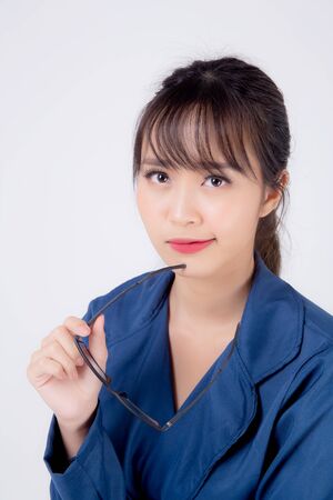 beautiful portrait young business asian woman standing wearing glasses with confident isolated on white background, asia businesswoman career secretary or accountant work success with smiling happy.の写真素材