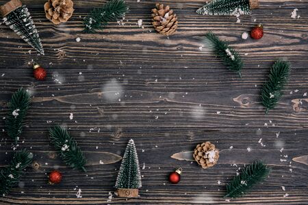 Christmas holiday composition decoration on wooden background, new year and xmas or anniversary with presents on wood table in season, top view or flat lay.の写真素材
