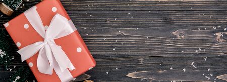 Christmas holiday composition with red gift box decoration on wooden background, new year and xmas...