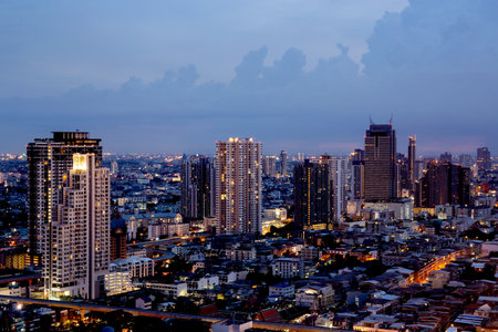 Bangkok THAILAND - July 11 2020 : View landscape of Bangkok tower with river in the evening, downtown and  cityscape in twilight at Thailand, skyscraper and condominium.の写真素材
