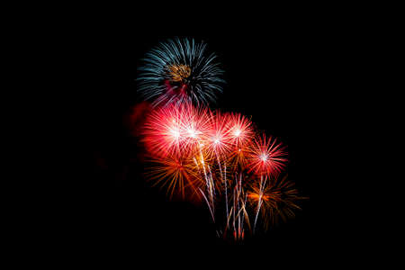Many flashing colorful fireworks in event amazing with black background celebrate New Year, holiday...