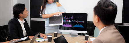 Young businesswoman present graph report and statistics of profit with finance in meeting conference...