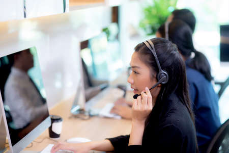 Customer service with friendly, man and woman call center and operator for support client, group of business team with assistance and consultant, adviser helpdesk and contact, communication concept.の写真素材