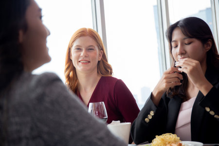 Happy team young business people in party celebrate success talking and conversation together with enjoyment at restaurant luxury, friendly and social colleague, meet friend and community concept.の写真素材