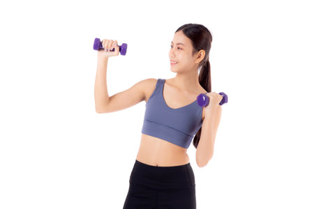 Portrait beautiful young asian woman lifting dumbbell isolated on white background, female fitness workout training with holding dumbbell for muscle strong and strength, sport and health care concept.の写真素材