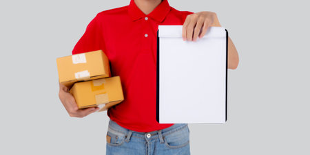 Portrait young asian man carrying box and showing document blank and presenting isolated white...