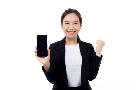 Portrait young asian businesswoman in suit showing smartphone isolated white background, business woman presenting with holding smart phone while success, achievement and business with expression.の写真素材