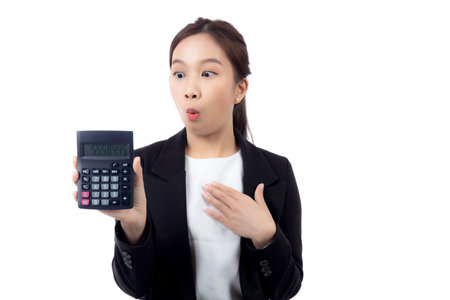 Portrait young asian businesswoman using calculator for calculate expense and budget for saving isolated white background, business woman calculate tax with excited, business and finance concept.の写真素材