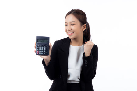 Portrait young asian businesswoman using calculator for calculate expense and budget for saving isolated white background, business woman calculate tax with excited, business and finance concept.の写真素材