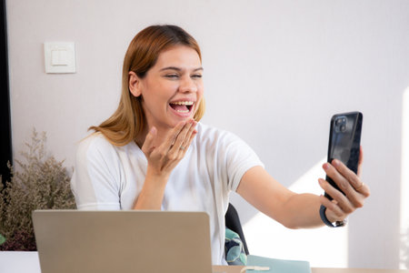 Happy young businesswoman video call for meeting in modern home office, happiness business woman...