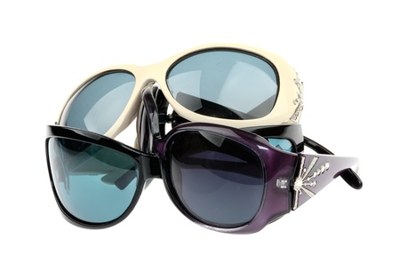 Many sunglasses isolated on a white backgroundの写真素材