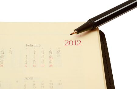 Opened planner with pen の写真素材