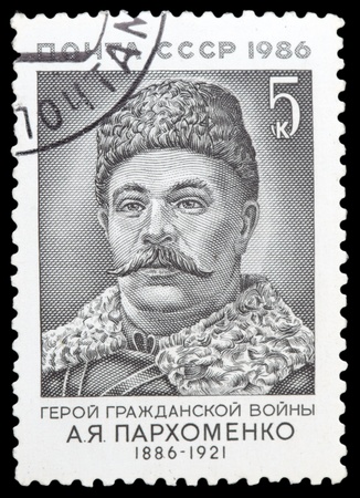 USSR - CIRCA 1986: A stamp printed in USSR shows Alexander Parkhomenko was a worker who joined the communists during the revolution. He fought Makhnovist anarchists in the Ukraine, circa 1986.の写真素材