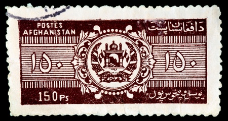 AFGHANISTAN - CIRCA 1984: A stamp printed in Afghanistan,devoted to the XIX congres UPU in HAmburg, circa 1984の写真素材