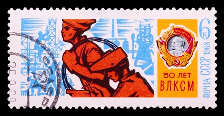 USSR - CIRCA 1968: A stamp printed in USSR, shows young workers and Order of Lenin, devoted to the...