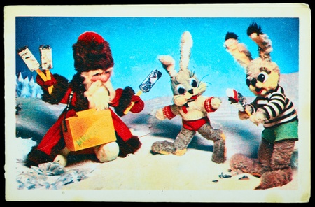 USSR-CIRCA 1978  Reproduction of antique postcard shows Santa Claus handing out ice cream rabbits, circa 1978のeditorial素材