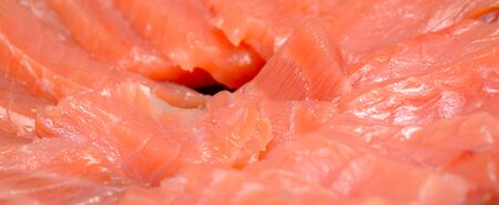 The pieces of red fish fillet on a backgroundの写真素材