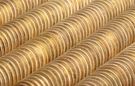 The stack of gold coins on a background