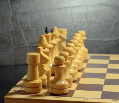 White chess pieces on a chess boardの写真素材