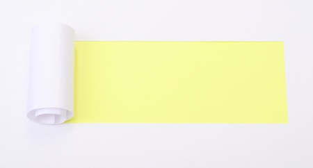 Ripped white paper with space for text with yellow backgroundの写真素材