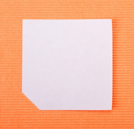 white blank paper on orange backgroundの写真素材
