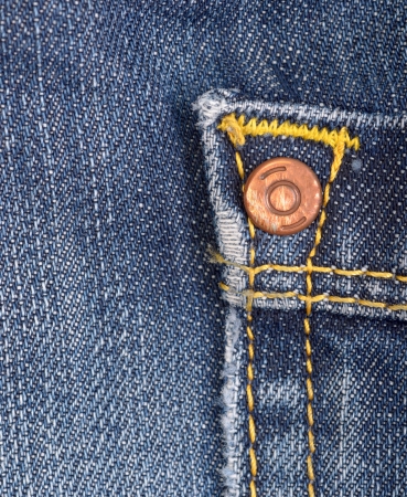 jeans texture with rivet on a backgroundの写真素材
