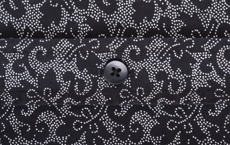The fabric background with button