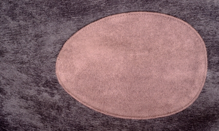 Blank cloth label sewed on a clothの写真素材