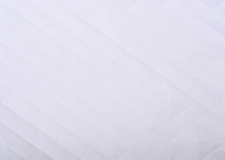 white textured sheet of paper on a backgroundの写真素材