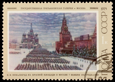USSR - CIRCA 1975: A stamp printed in the USSR, shows Parade on the Red Square on November 7, 1941, circa 1975のeditorial素材