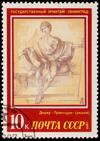 USSR - CIRCA 1987: A stamp printed in the USSR, shows a painting artist Albrecht Durer "Justice", circa 1987のeditorial素材