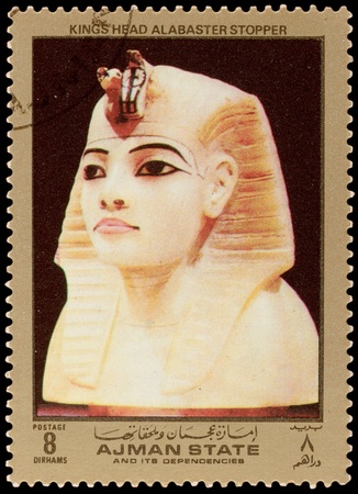 AJMAN STATE - CIRCA 1971: A stamp printed in the AJMAN STATE, shows Egyptian treasures, series, circa 1971のeditorial素材