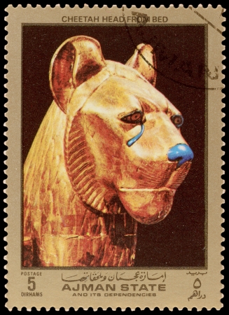 AJMAN STATE - CIRCA 1971: A stamp printed in the AJMAN STATE, shows Egyptian treasures, series, circa 1971のeditorial素材