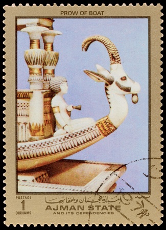 AJMAN STATE - CIRCA 1971: A stamp printed in the AJMAN STATE, shows Egyptian treasures, series, circa 1971のeditorial素材