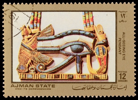 AJMAN STATE - CIRCA 1971: A stamp printed in the AJMAN STATE, shows Egyptian treasures, series, circa 1971のeditorial素材