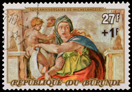 BURUNDI - CIRCA 1975: A stamp printed in the BURUNDI, shows Michelangelo Buonarroti fragment, 500 years anniversary, circa 1975のeditorial素材
