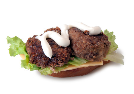homemade beef hamburger isolated on a white backgroundの写真素材