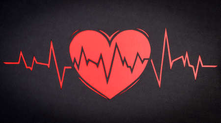 heart cardiogram on a black background paperの写真素材