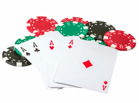 Playing cards with chips isolated on a white background