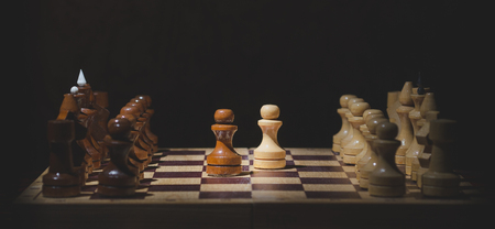 Chess figure pawn. Close-up on a chess boardの写真素材