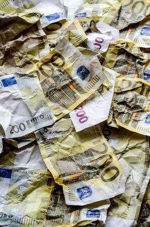 Wrinkled banknotes, euros. Close-up backgroundの写真素材