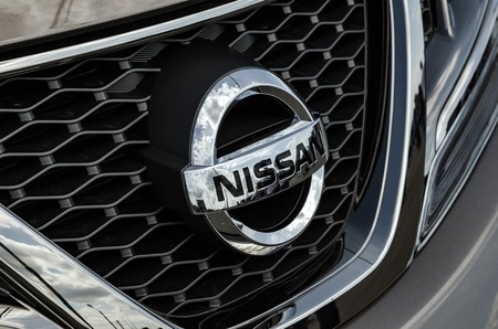 NIZHNY NOVGOROD, RUSSIA - JULY 21, 2013: Auto show. Car Logo Nissanのeditorial素材