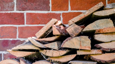 Pile of firewood. Preparation of firewood for the winter. Backgroundの写真素材