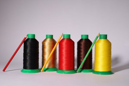 Colorful Sewing Thread Textile Background Photo