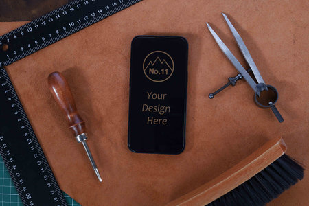 Phone Mockup Isolated on Leather with Leather Crafting Tools