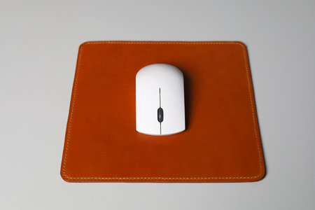 Leather Mousepad Isolated on Office Desk with White Mouse