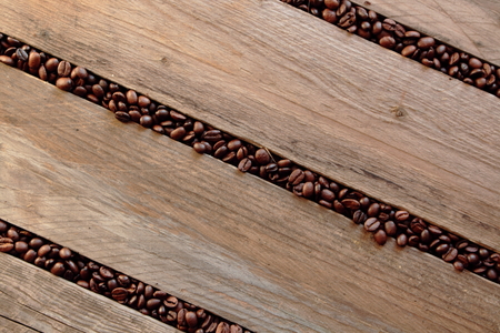 Coffee beans scattered between the slats.の写真素材