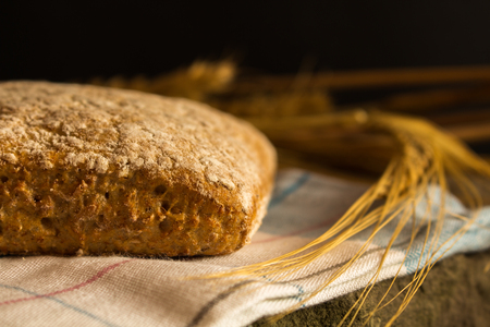 Fresh bread with ripe cereal blades.の写真素材