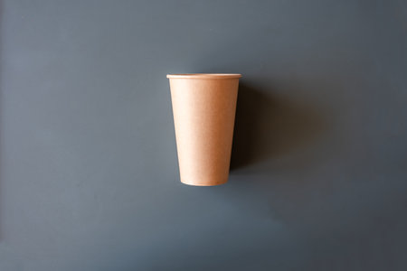 cup of coffee and Coffee filter used for american coffee machine  on green background with mockup...