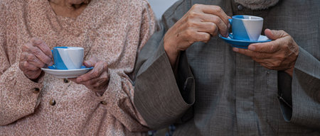 Arabic old couples drinking coffee togetherの写真素材